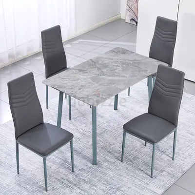 Brand new dining table with 4 chairs available