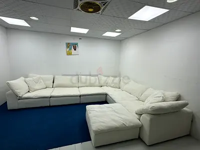 Like new condition marina home corner sofa with footstool