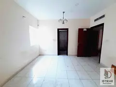 Centralized AC 2BR Apartment with Balcony in Abu Shagara - AED 40,000