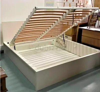 Ikea queen size hydraulic bed with Ikea mattress  is available