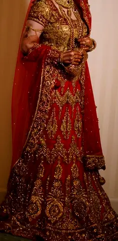 Stunning Traditional Red Wedding Dress with Intricate Embroidery