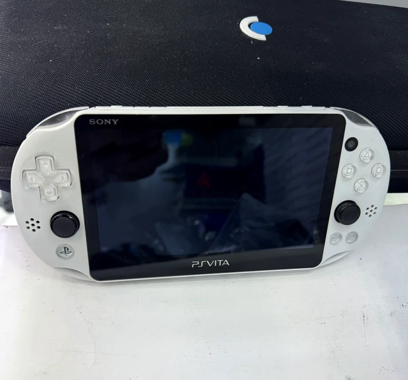 جهاز سوني PS Vita المحمول - حالة رائعة!63173866632579111
