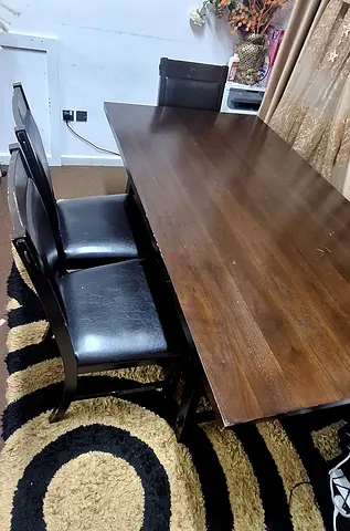 Elegant Dining Table with Four Stylish Leather Chairs and leather Stool