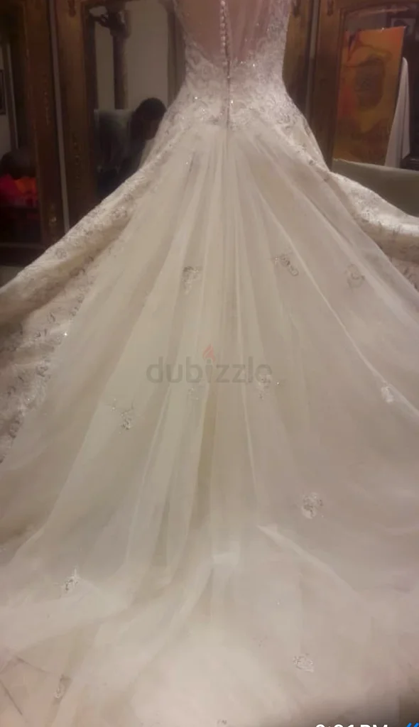 فستان زفاف من تصميم مصمم أزياء63171760609026112