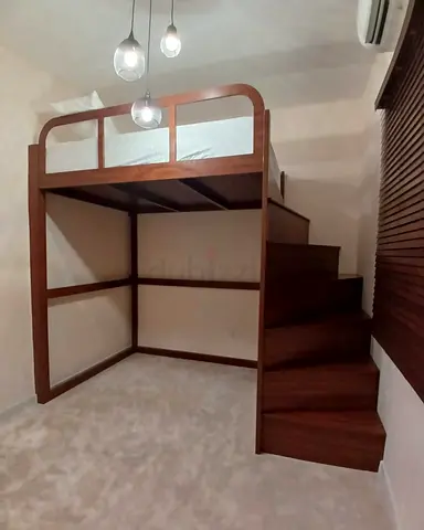 Space-Saving Wooden Loft Bed with Steps