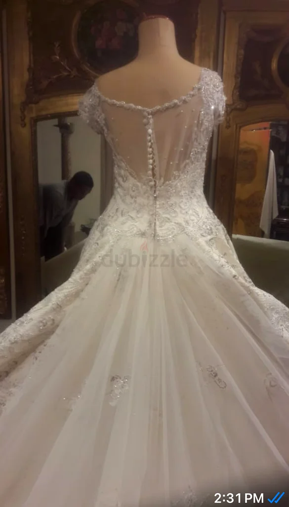 فستان زفاف من تصميم مصمم أزياء63171760609026111