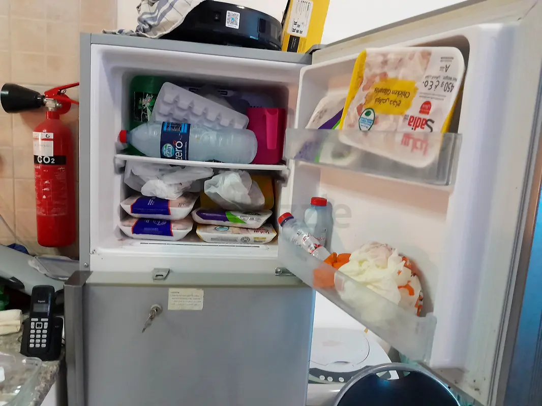 Compact Refrigerator for Sale - Ideal for Small Spaces!