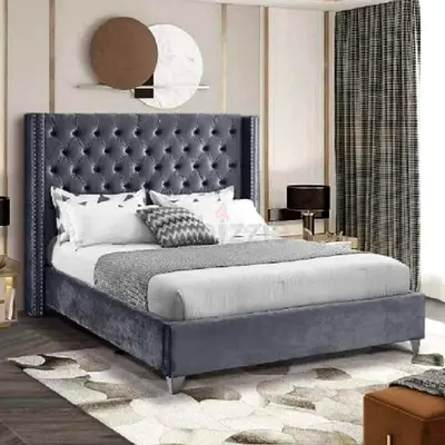 Luxurious Bed with Tufted Grey Headboard