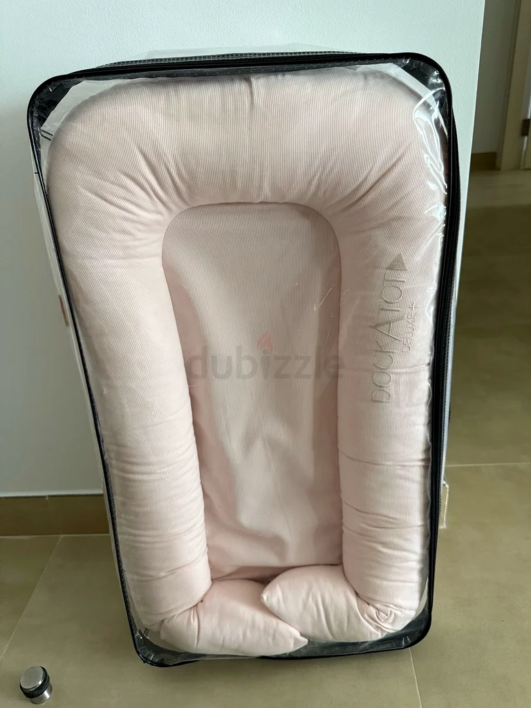 DockATot Deluxe+ pod, docking station for babies. Almost 🆕 , used couple of times.  350 aed632048635825951122