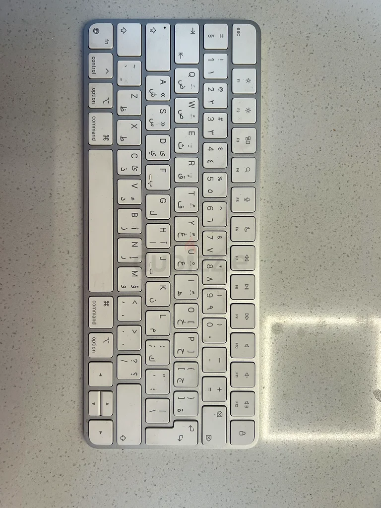 لوحة مفاتيح Apple السحرية - الإنجليزية الأمريكية/العربية632656012097291113