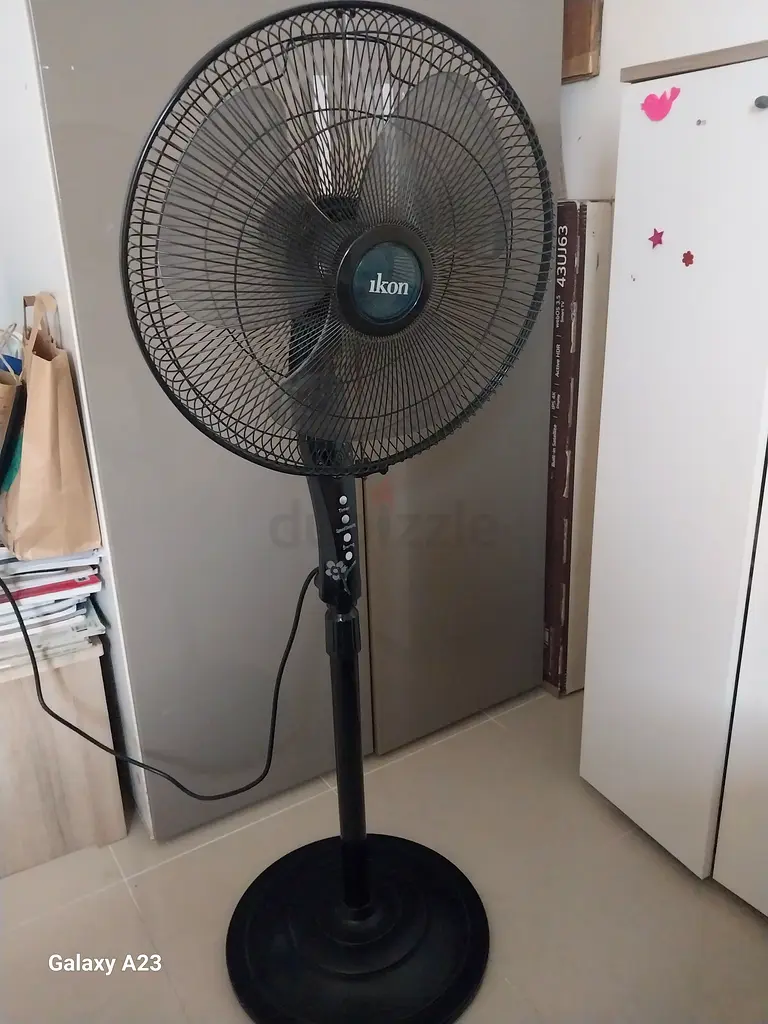 Cool Down This Summer with a Stylish Standing Fan!