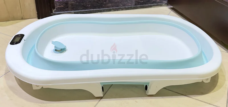 Stylish and Space-Saving Adjustable Baby Bathtub63198142270978112