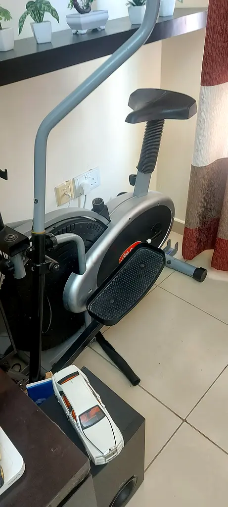 Revamp Your Fitness with This Stylish Exercise Bike! Also a body twister included