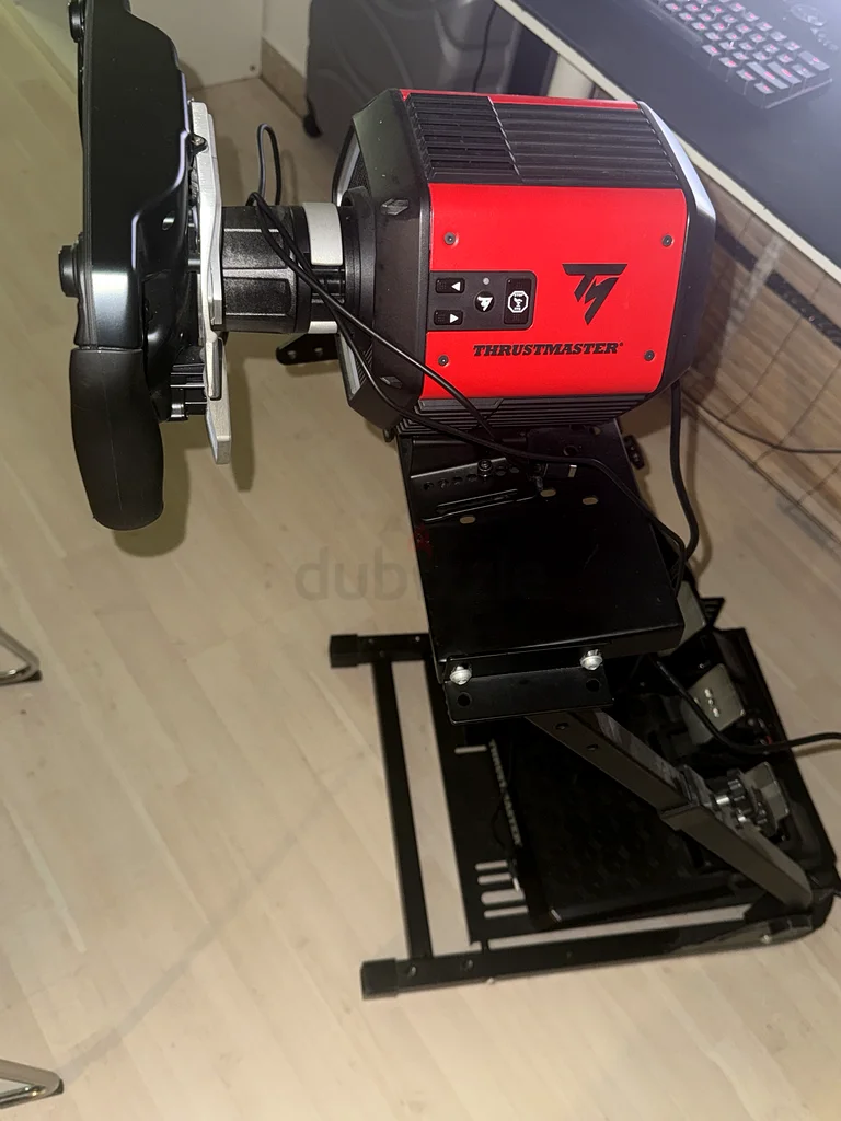 Ferrari SF1000 wheel with T818 wheel base, t3pm pedals, and a stand with all cables63229685787266113
