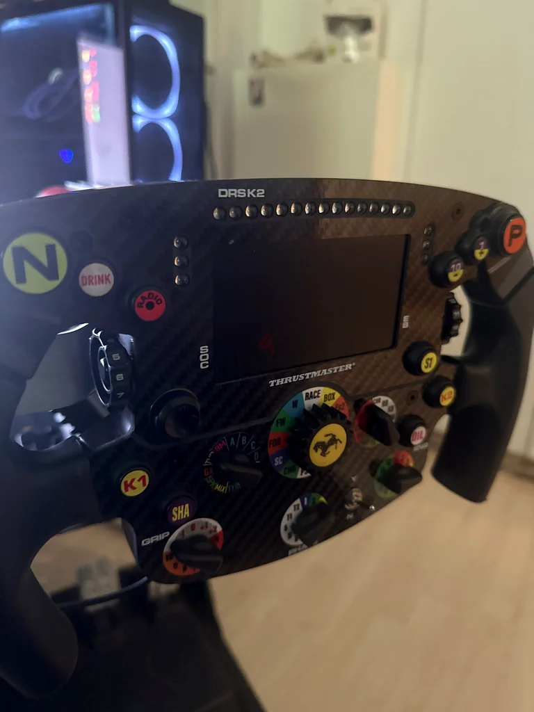 Ferrari SF1000 wheel with T818 wheel base, t3pm pedals, and a stand with all cables63229685787266111