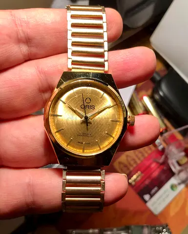 Elevate Your Style with This Luxurious Oris Gold Watch