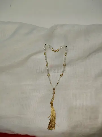 Elegant Gold and Pearl Tassel Necklace