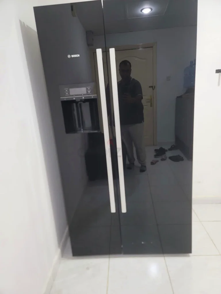 ثلاجة بوش باب جنب باب مع موزع ماء وصانعة ثلج باللون الأسود629326951816991120