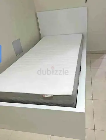 Ikea malam single bed 90/200 with  IKEA mattress is available in new condition.