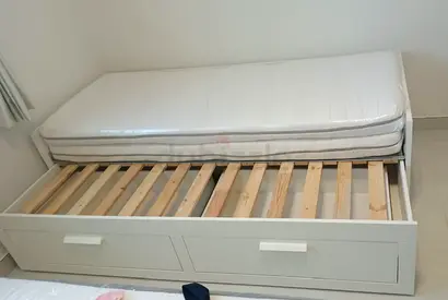 IKEA brimness Day bed with 2 storage drawers underneath and with 2 IKEA mattresses.