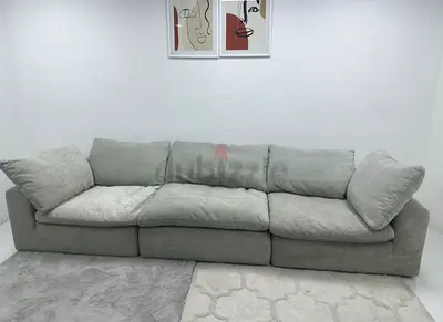 As perfect condition pianca feather filled sofa