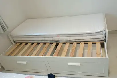 IKEA brimness Day bed with 2 storage drawers underneath and with 2 IKEA mattresses.
