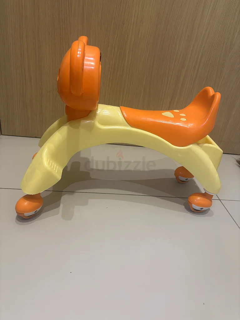 تعلم المشي وركوب الألعاب63176639432193112