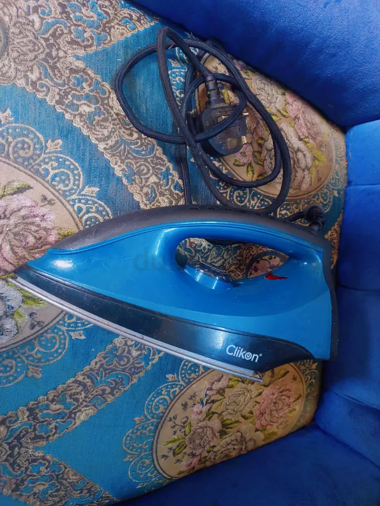 Cliken Electric Iron - Your Perfect Garment Companion!