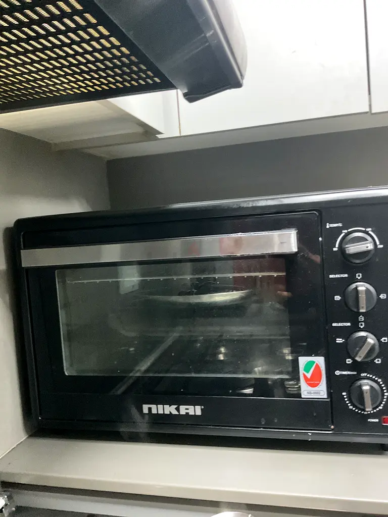 Nikai Electric Oven - Perfect for All Your Baking Needs!