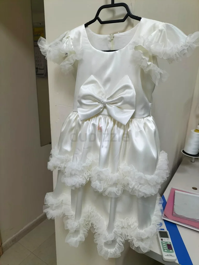 Elegantly Adorable White Baby Dress - Perfect for Special Occasions!63204861428739112