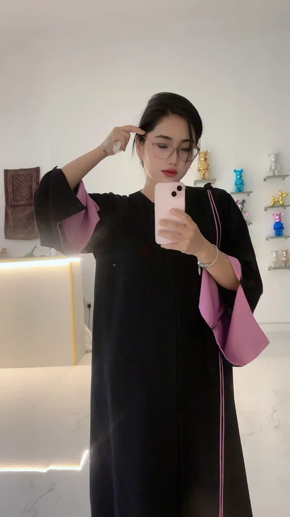 Elegant Black Abaya with Stylish Pink Accents62935675483907111