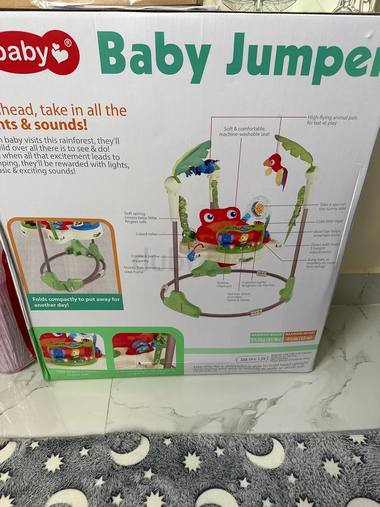 Whimsical Baby Bouncer with Fun Toys!63205362311426112