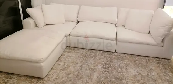 Looks like new condition marina home corner sofa with footstool