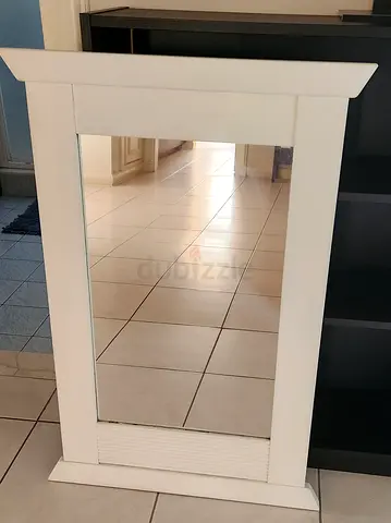 White painted wooden framed mirror