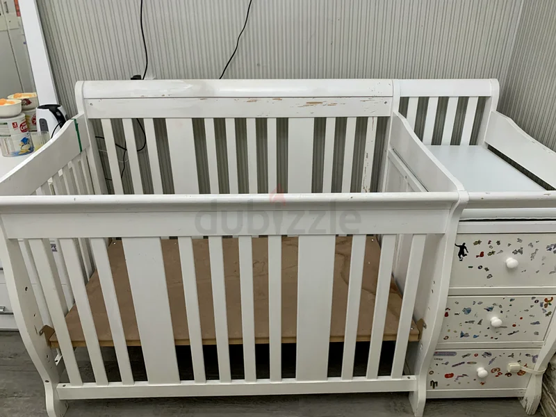 Stylish White Crib with Attached Dresser - Perfect for Your Baby's Nursery!63206877967875111