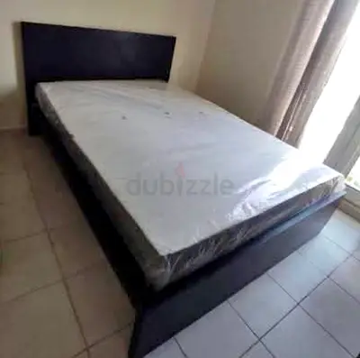 IKEA malam double size 140/200 bed with IKEA mattress and 2 storage drawers undern