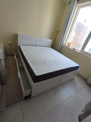 IKEA brimness queen size bed with 4 storage drawers underneath and with  IKEA mattress is available