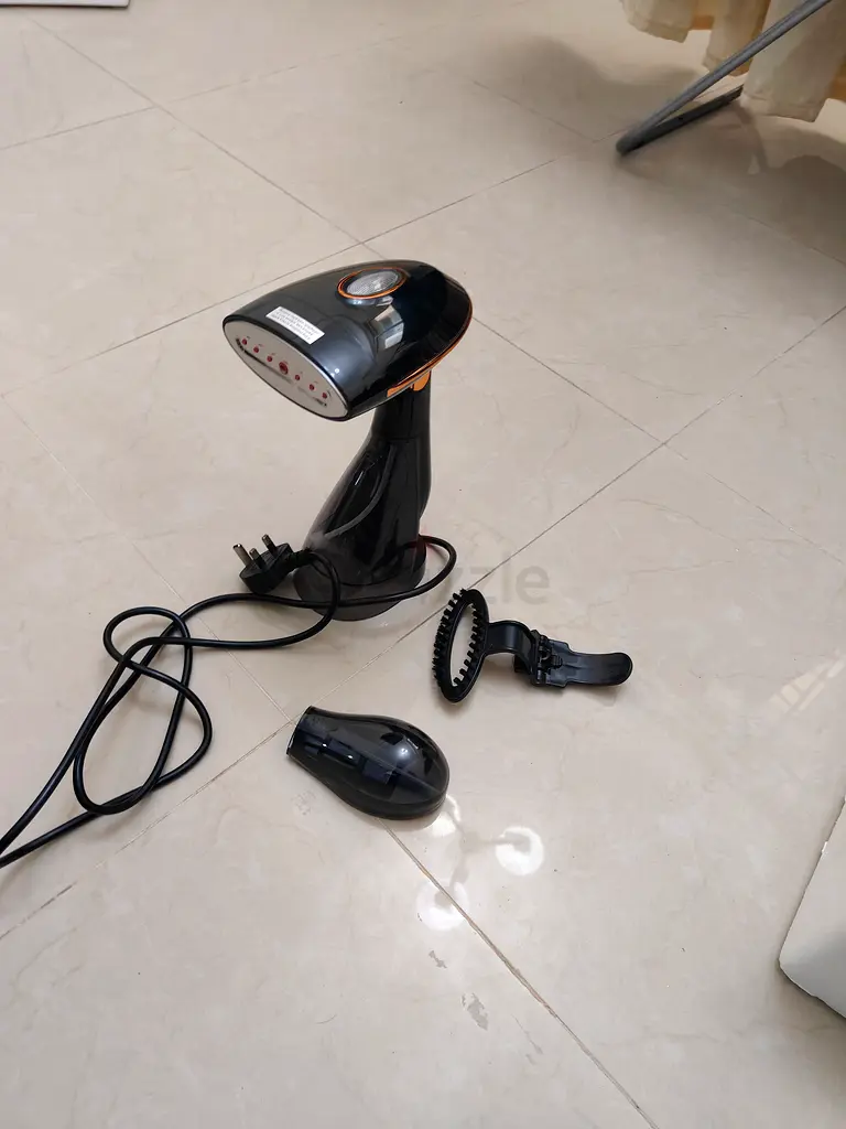 بخار ملابس محمول فعال