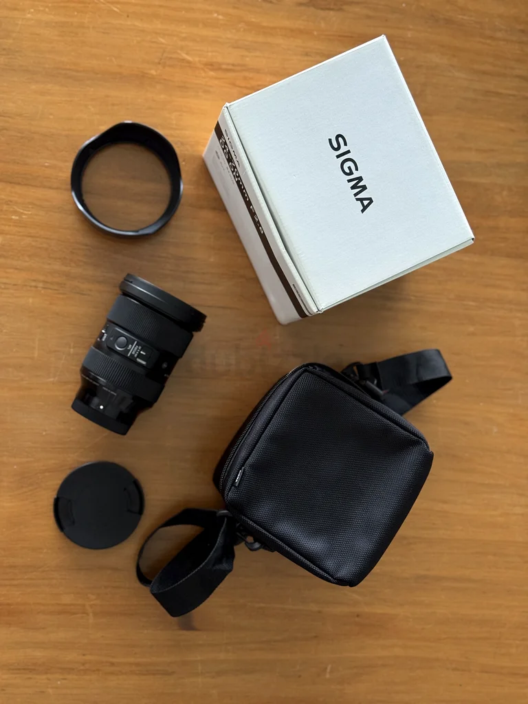 عدسة سيجما 24-70 مم F2.8 Art مع إكسسواراتها، بفتحة Sony E63233641589506111