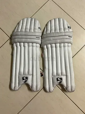 Top-Quality SG Cricket Pads With a free SG Helmet for Sale - A Bit Used