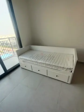 IKEA Hamnes Day bed with 3 storage drawers underneath and with 2 IKEA mattresses