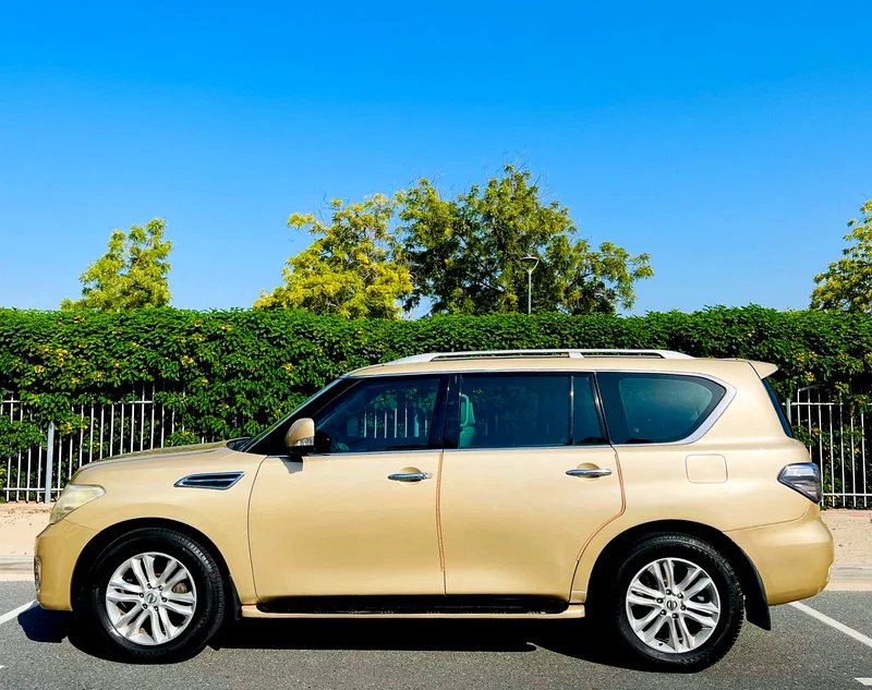 نيسان باترول LE 5.6 V8 | 400 حصان | 2012 | خليجي | ذهبي | 5 كاميرات | رادار | 49,000 درهم63228786694403111