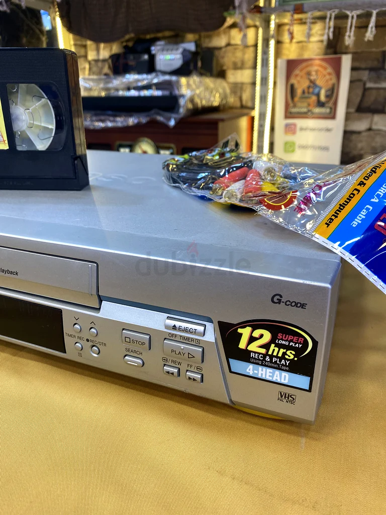 مشغل فيديو من باناسونيك مع مجموعة كلاسيكية من أشرطة VHS63265095403139113