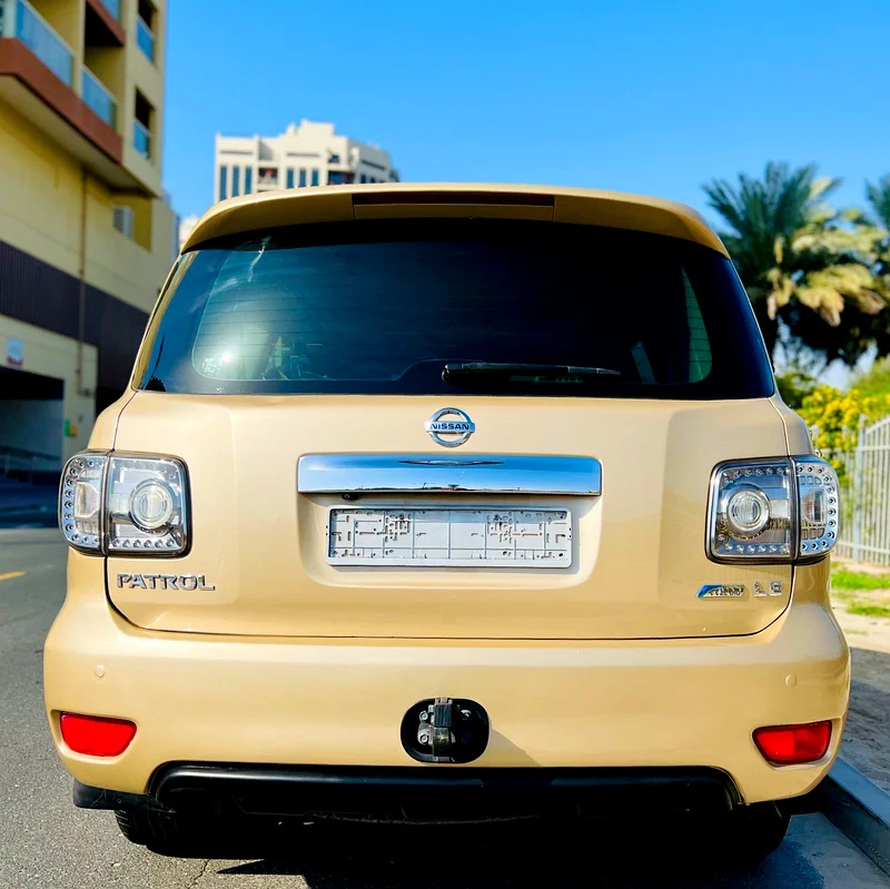 نيسان باترول LE 5.6 V8 | 400 حصان | 2012 | خليجي | ذهبي | 5 كاميرات | رادار | 49,000 درهم63228786694403114