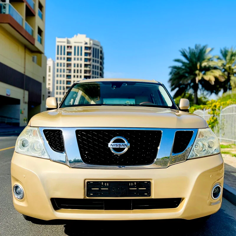 نيسان باترول LE 5.6 V8 | 400 حصان | 2012 | خليجي | ذهبي | 5 كاميرات | رادار | 49,000 درهم63228786694403112
