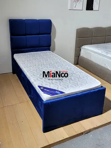 Elegant Blue Upholstered Bed Frame for Stylish Nights