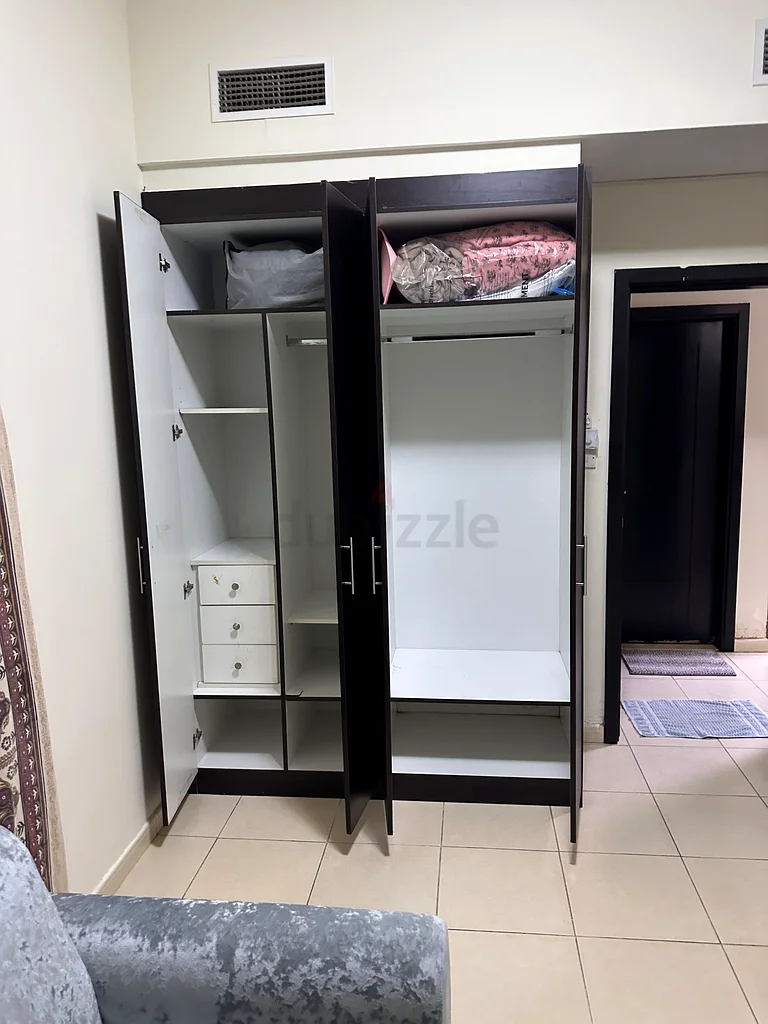 private bedroom for rent in 1BHK flat in Liwan/Queue point dubai62868789744643113