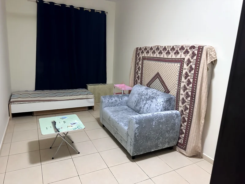 private bedroom for rent in 1BHK flat in Liwan/Queue point dubai62868789744643112