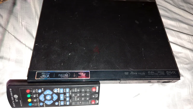 مشغل أقراص LG بلو راي يعمل مع جهاز التحكم عن بعد (بدون أسلاك)63262938972673111