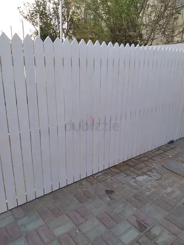 Chic White Pickett Fence: Perfect for Your Garden!